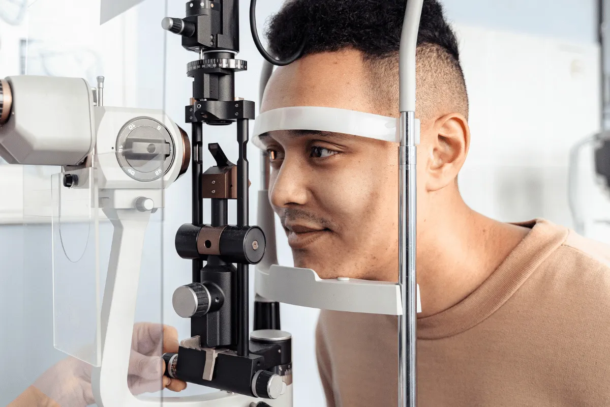 a man at his local eye doctor for an eye exam